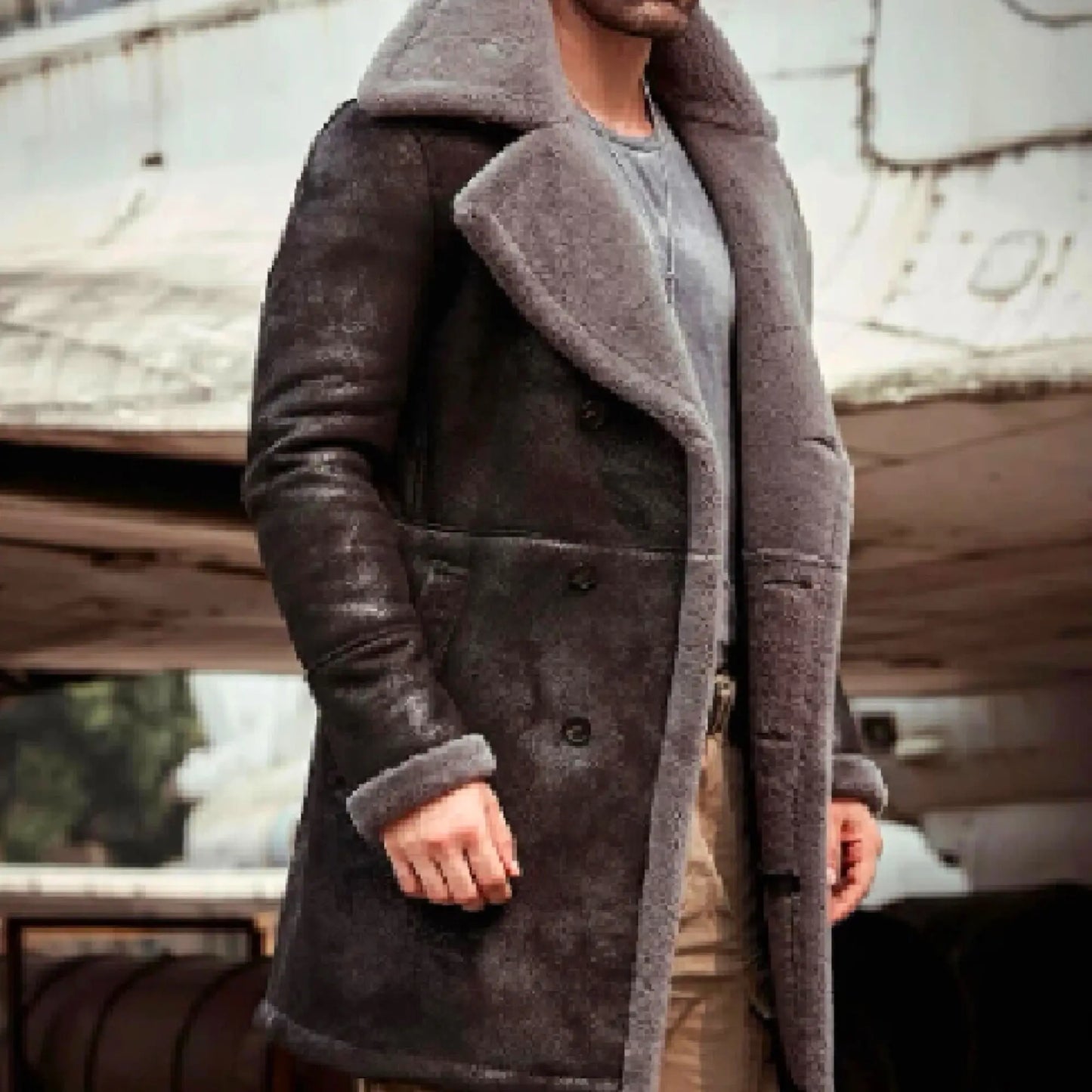 Men's long sheepskin trench coat in dark brown with grey shearling lining, ideal for stylish winter wear in UK, USA, Canada, and EU.