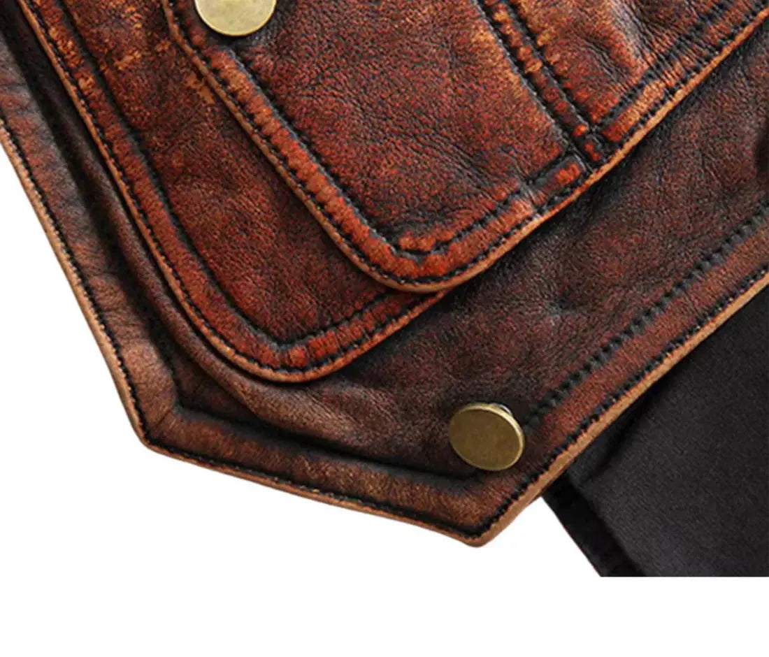 My Store Leather Vest close up of distressed brown leather pocket flap with brass snap buttons and visible stitching