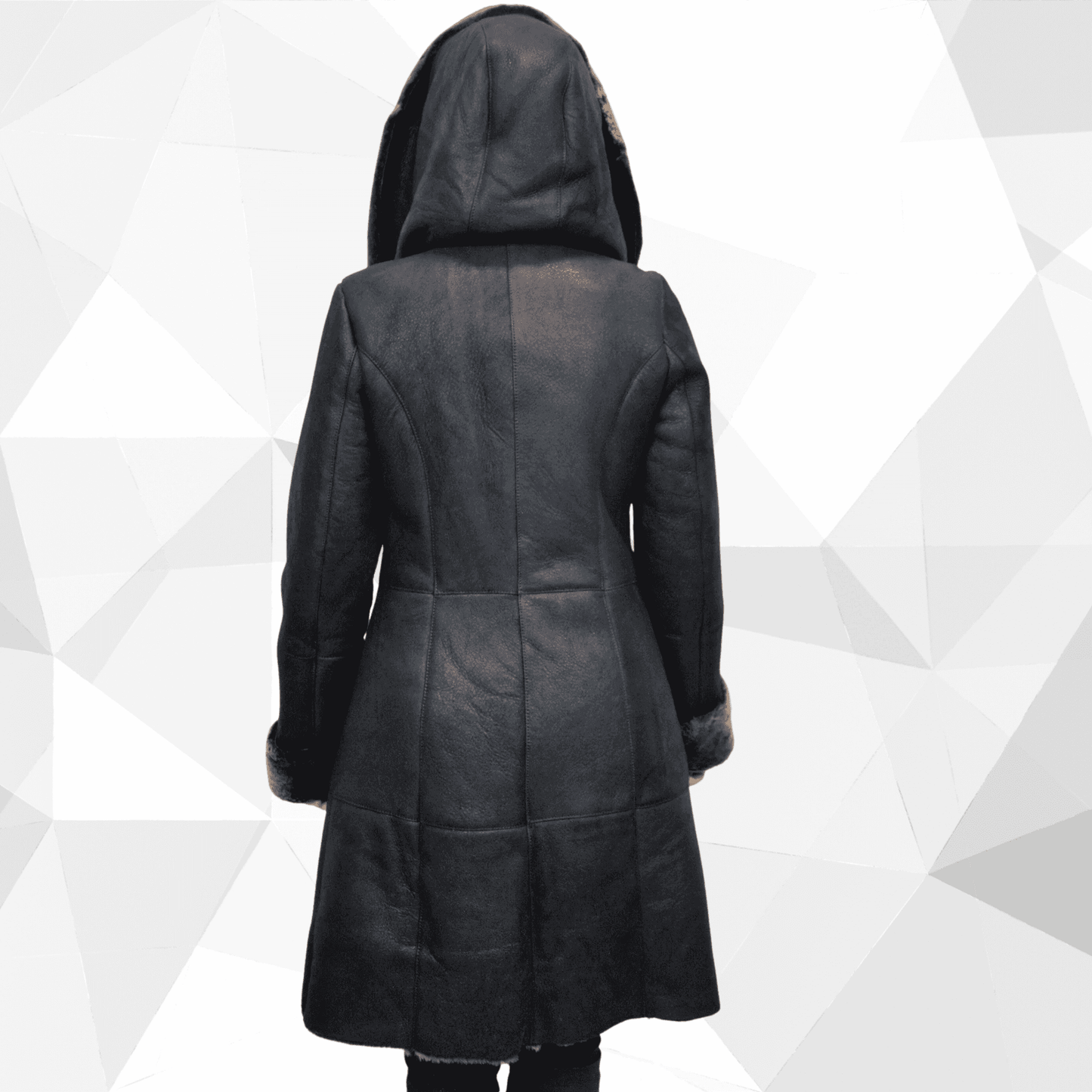Back view of black hooded Sheepskin Shearling Coat mid length with fur trimmed cuffs and tailored seams