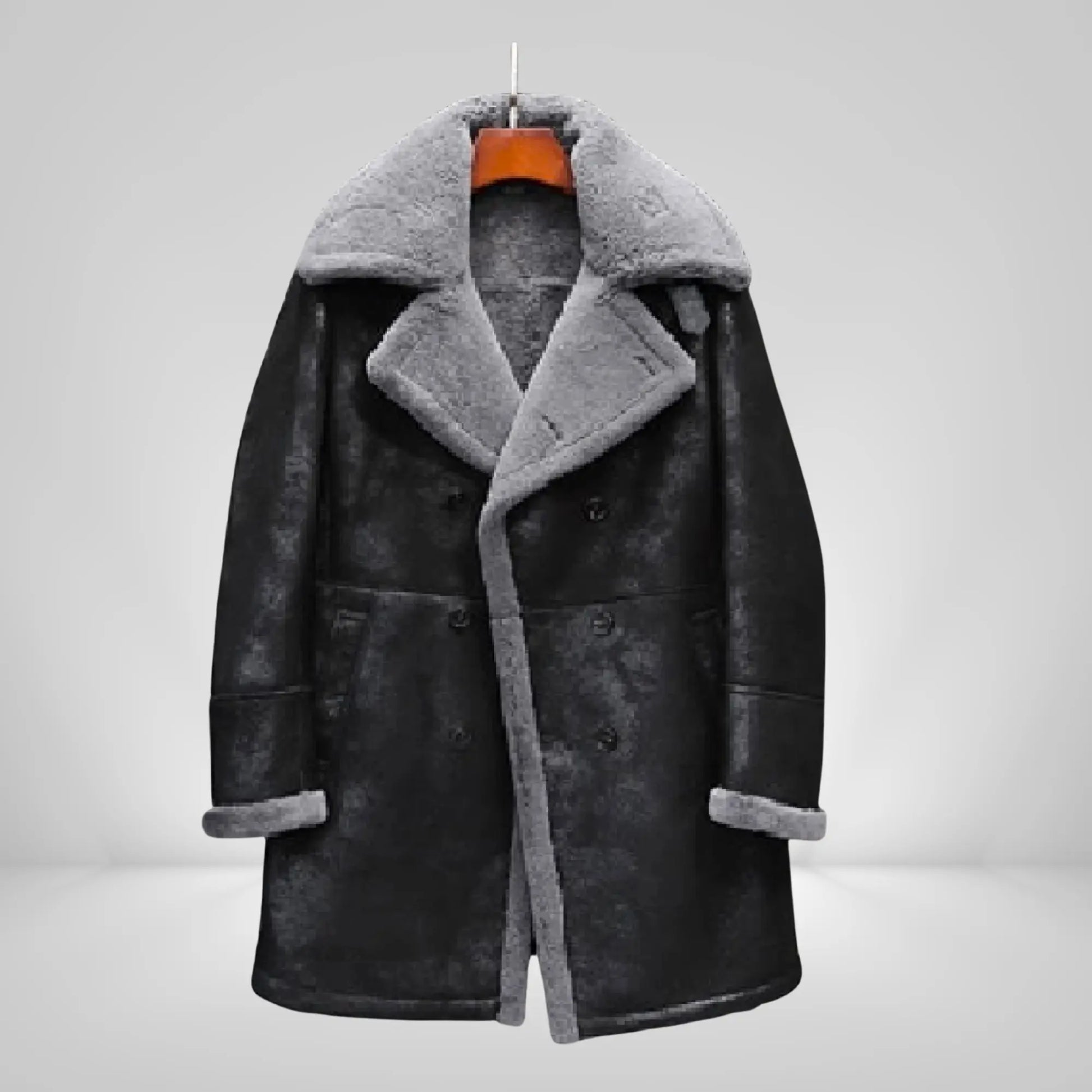 Men's long sheepskin trench coat in black with grey shearling lining, ideal for stylish winter wear in cold climates like UK, USA, and Canada.