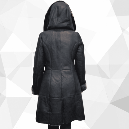 Back view of black hooded Sheepskin Shearling Coat mid length with fur trimmed cuffs and tailored seams